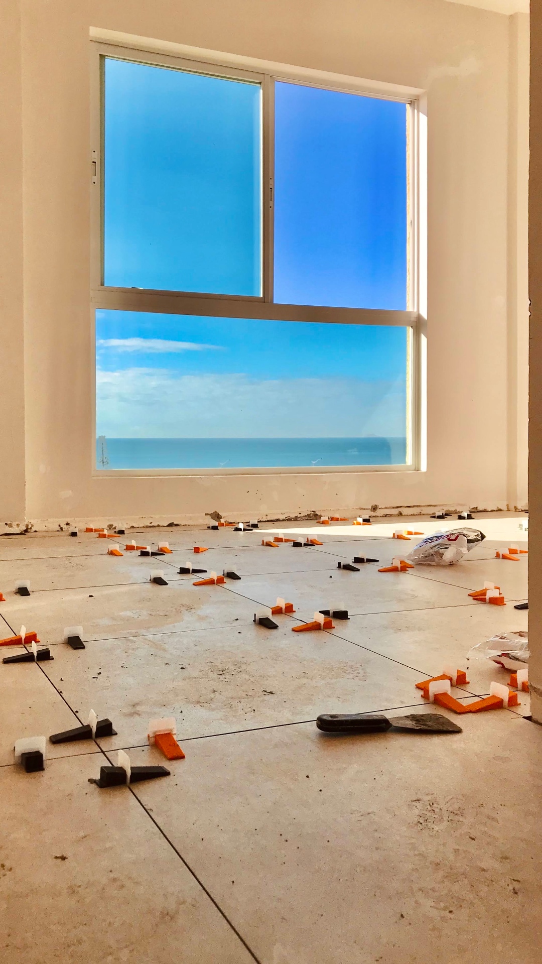 Tile Leveling — Ocean View Suite